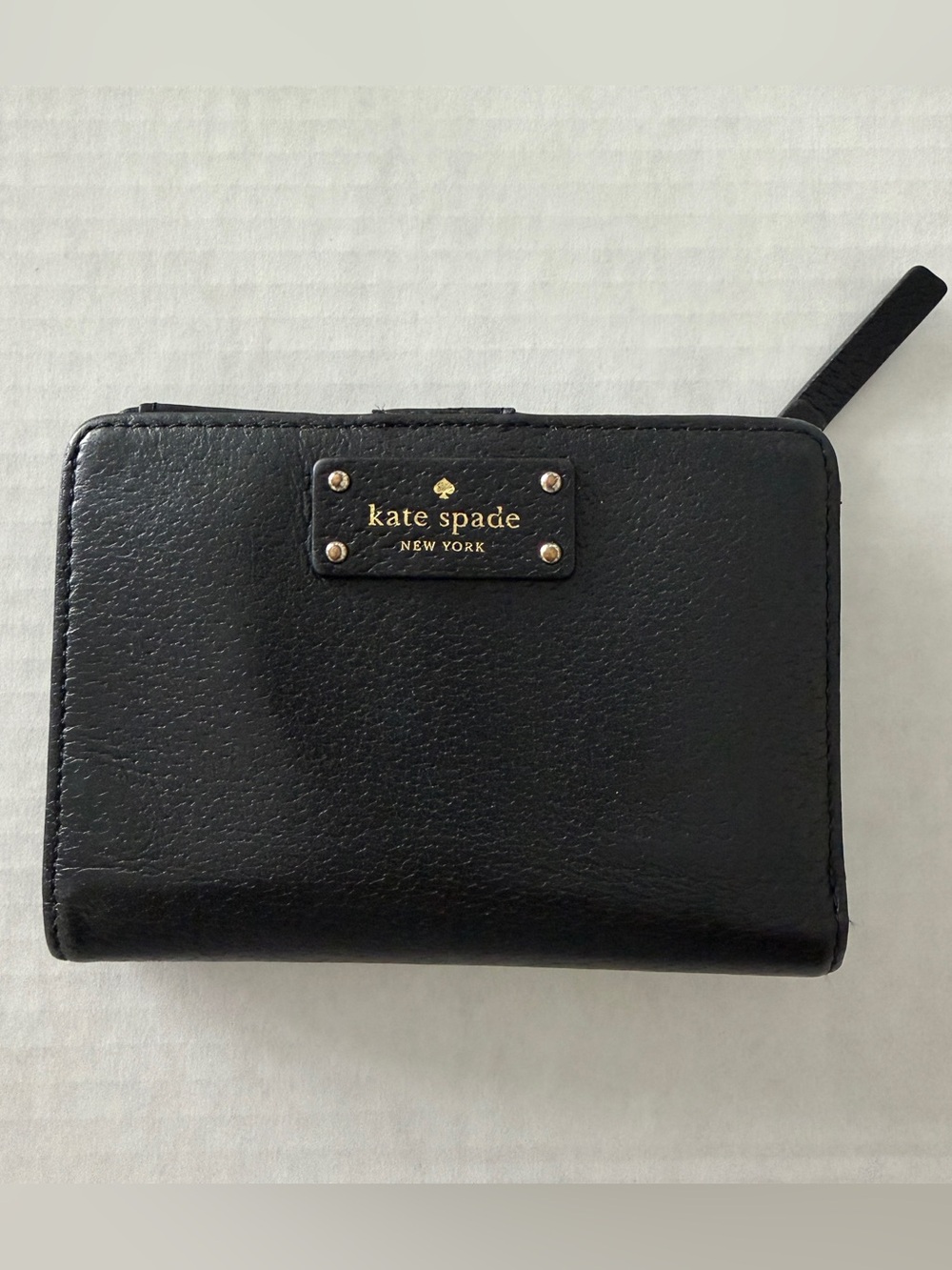 kate spade Black Leather Zip-Around Wallet with Gold Plaque